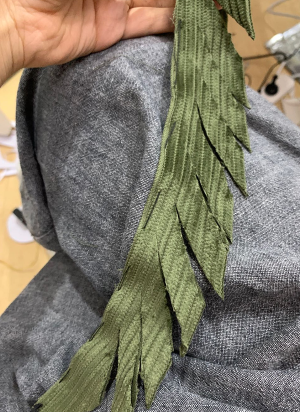 picture of fabric being cut